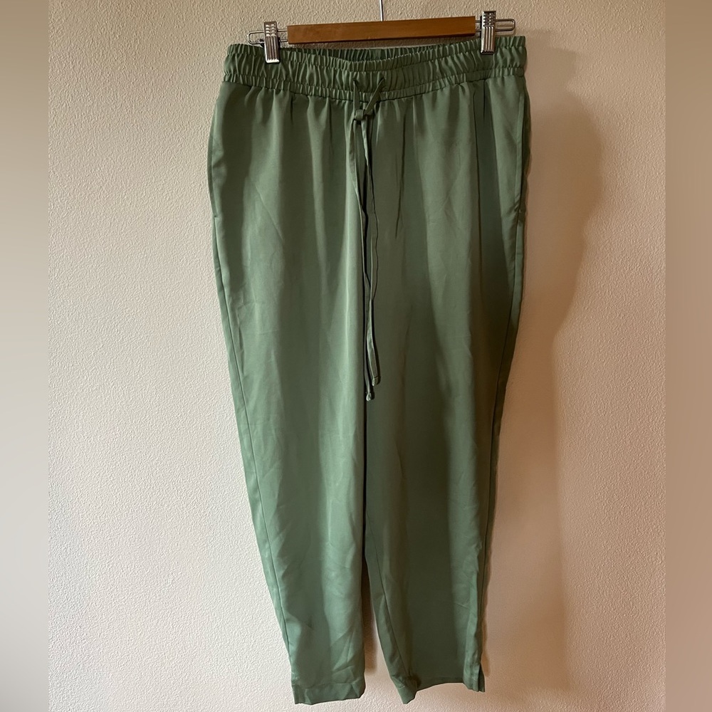 Soft and silky pants, size M. Color is a mint-like greenish.